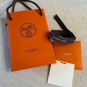 Hermes ceramic ornament w/ribbon & bag